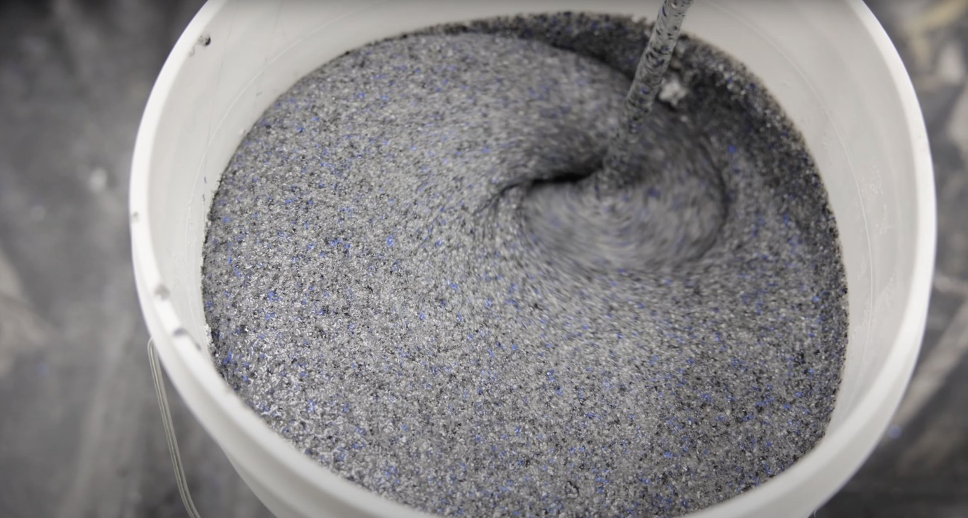 High-quality concrete mix being prepared for residential project